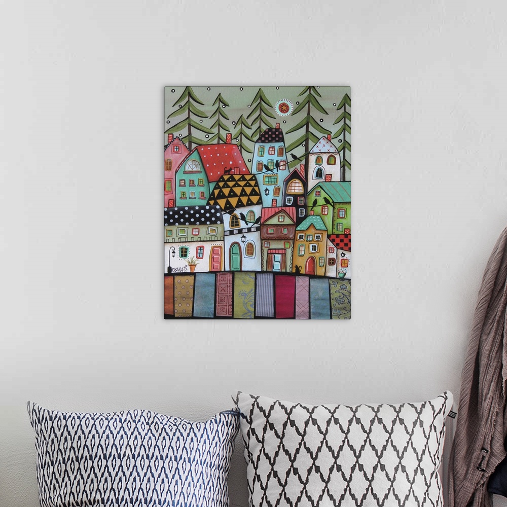 A bohemian room featuring Contemporary folk-art style painting of a rolling hill landscape with houses and patchwork fields.