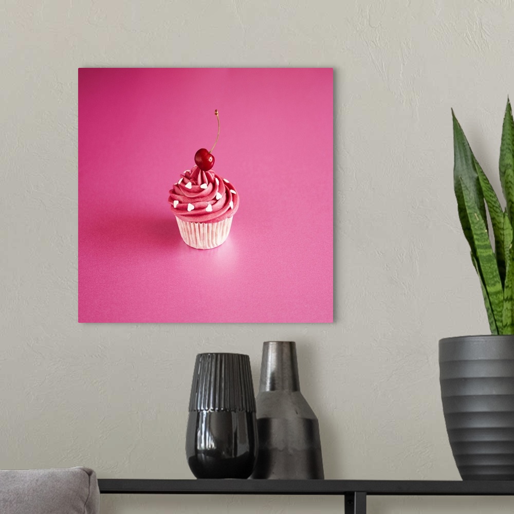 A modern room featuring Pink Cake on Pink with Cherry