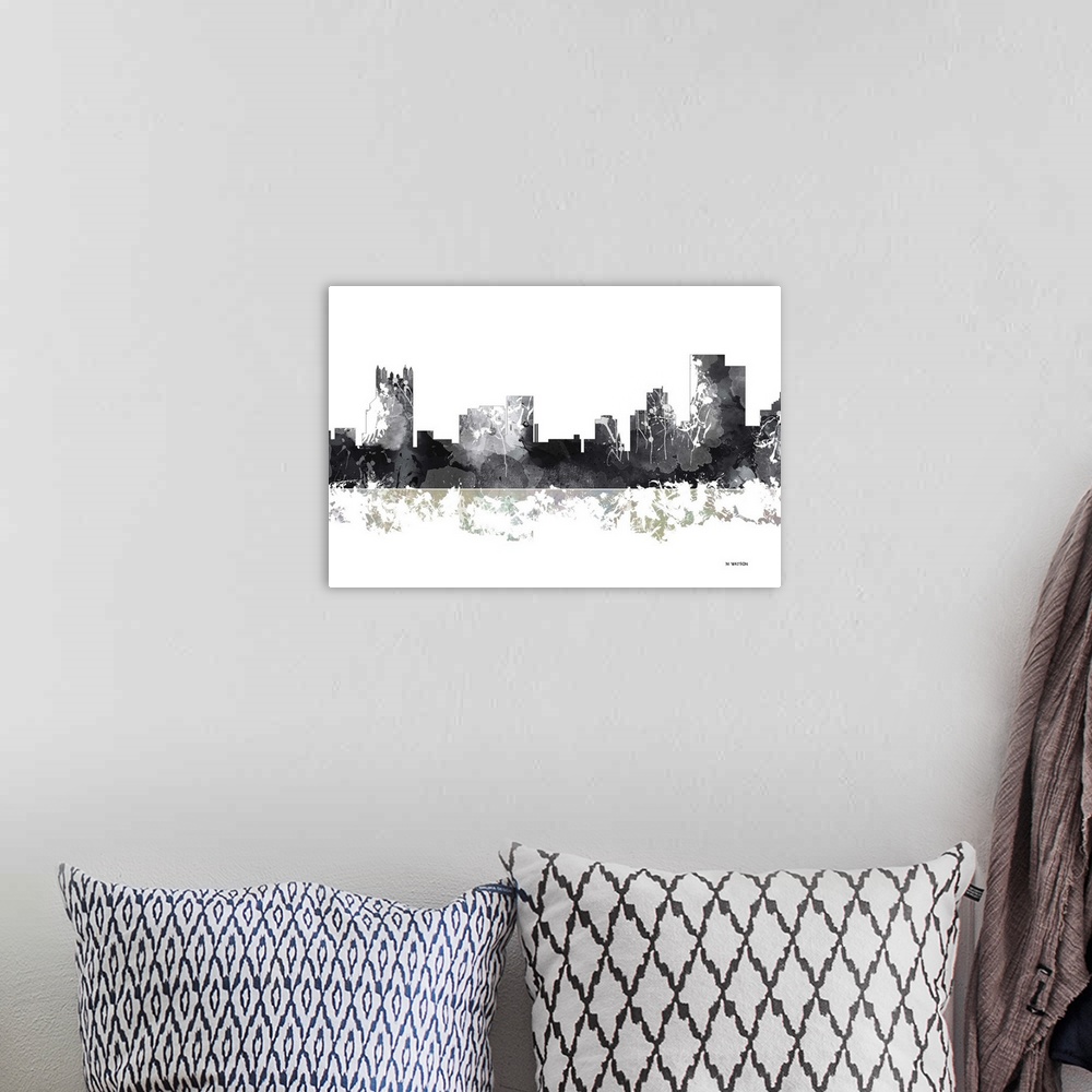 A bohemian room featuring Contemporary black and white watercolor skyline casting a mirror-like reflection below.