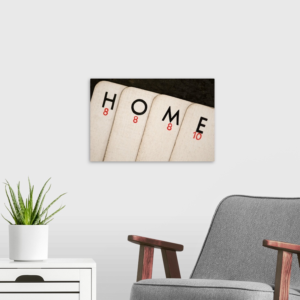 A modern room featuring Playing Cards - Spelling 'Home'