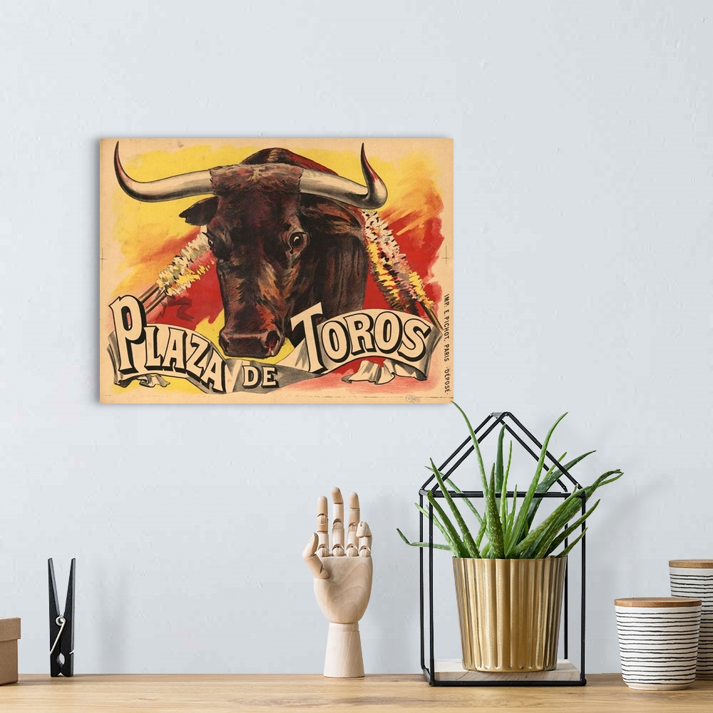 A bohemian room featuring Vintage advertisement for bull fighting.