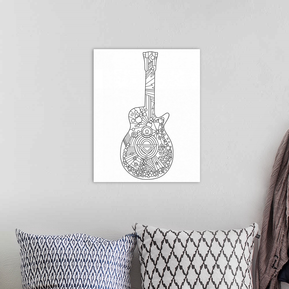 A bohemian room featuring Black and white line art of a guitar.