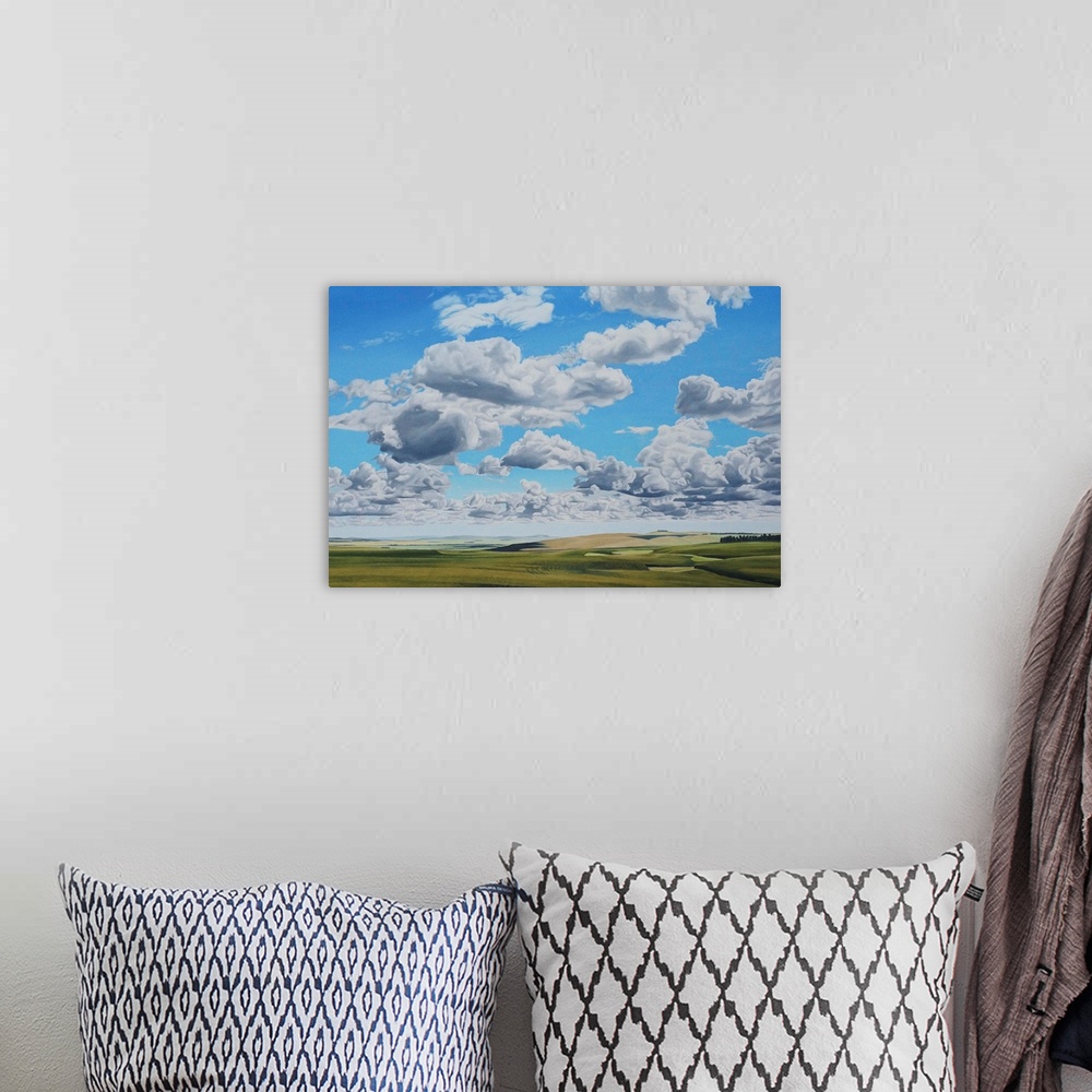 A bohemian room featuring Contemporary painting of an idyllic landscape with fluffy clouds overhead.