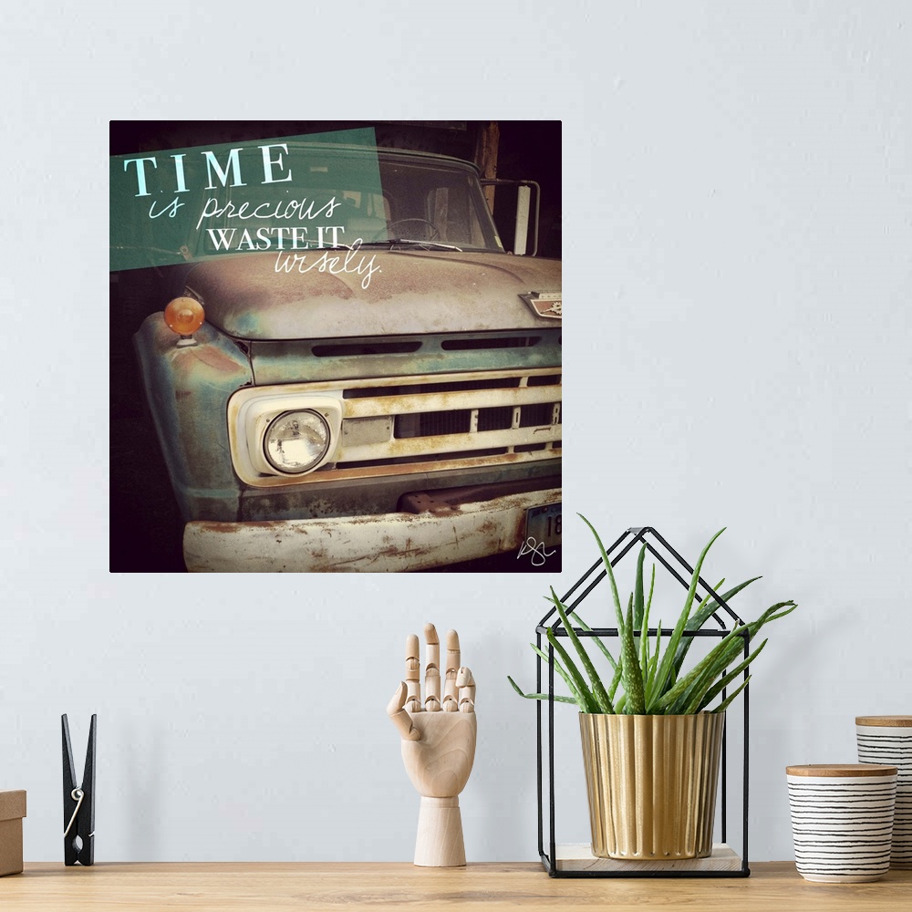 A bohemian room featuring Motivational text against background photograph of a old beat up truck.
