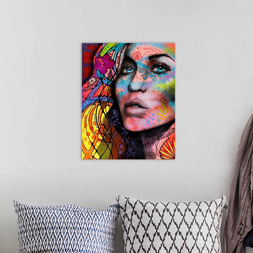 A bohemian room featuring Abstract illustration of a woman's face and flowing hair with colorful graffiti-style markings.