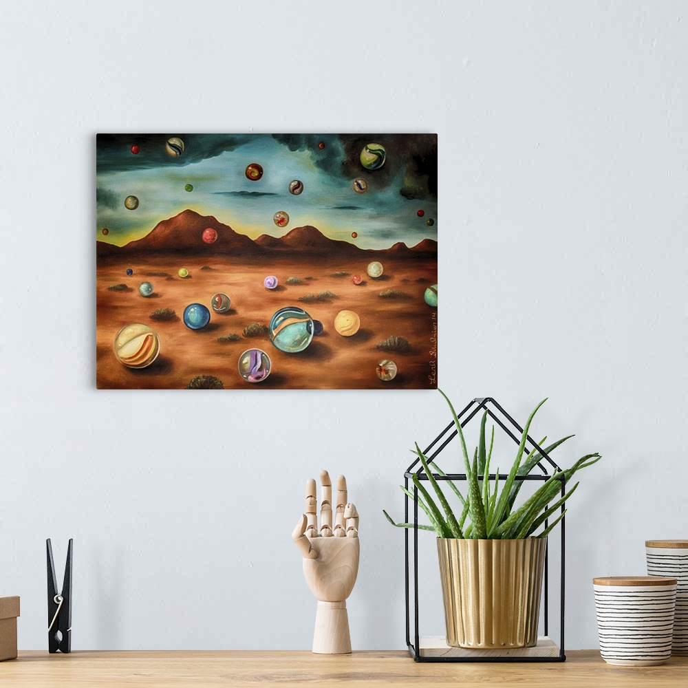 A bohemian room featuring Surrealist painting of a desert landscape with marbles raining down from the sky.
