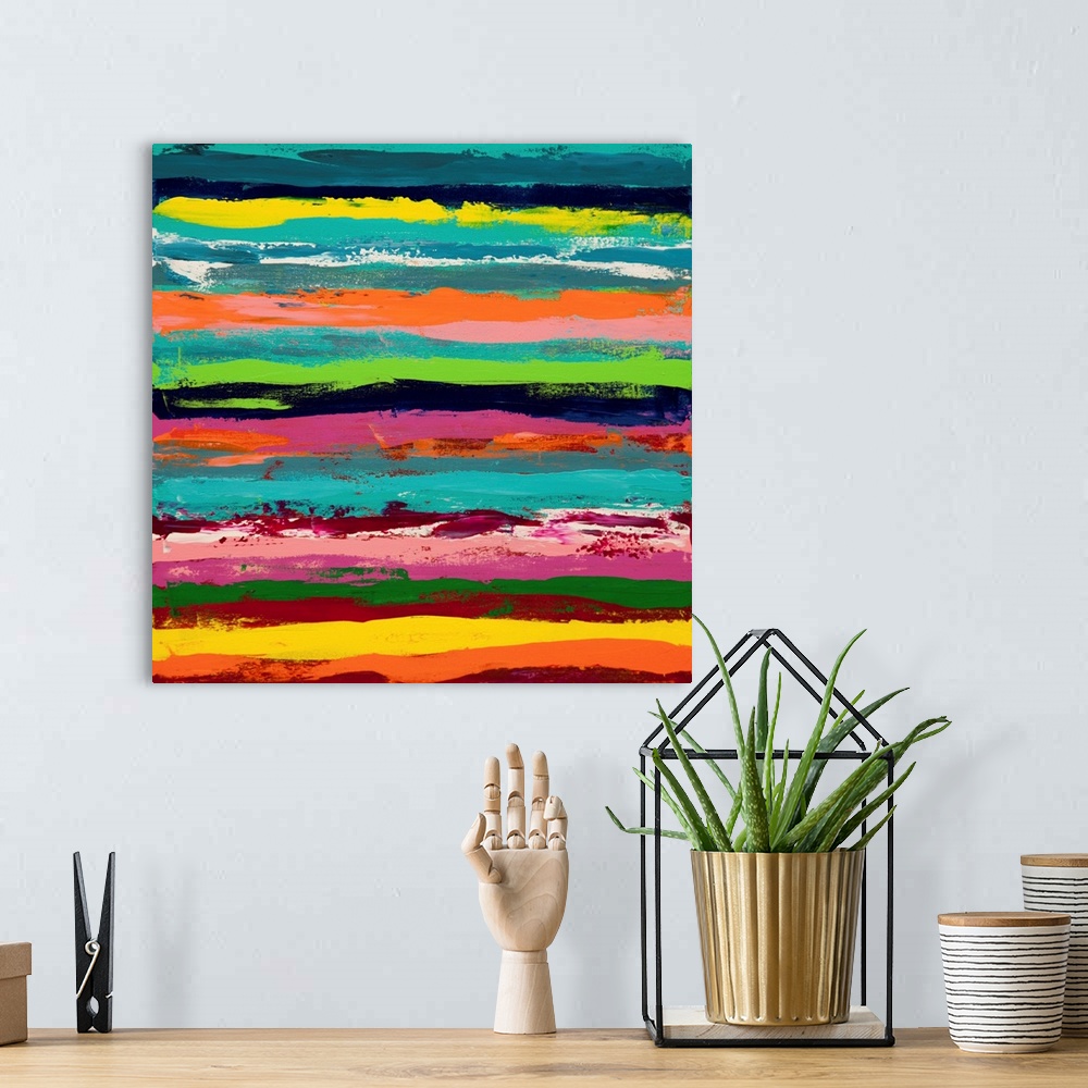 A bohemian room featuring A contemporary abstract painting using vibrant colors in horizontal stripes.