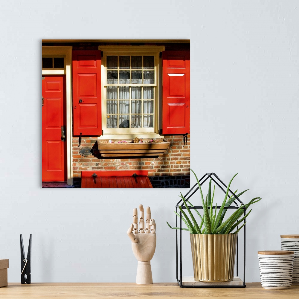 A bohemian room featuring Red Door, Red Shutters