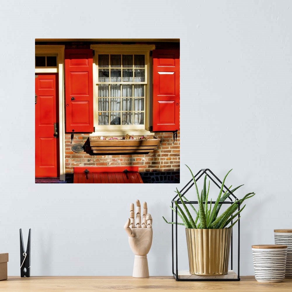 A bohemian room featuring Red Door, Red Shutters
