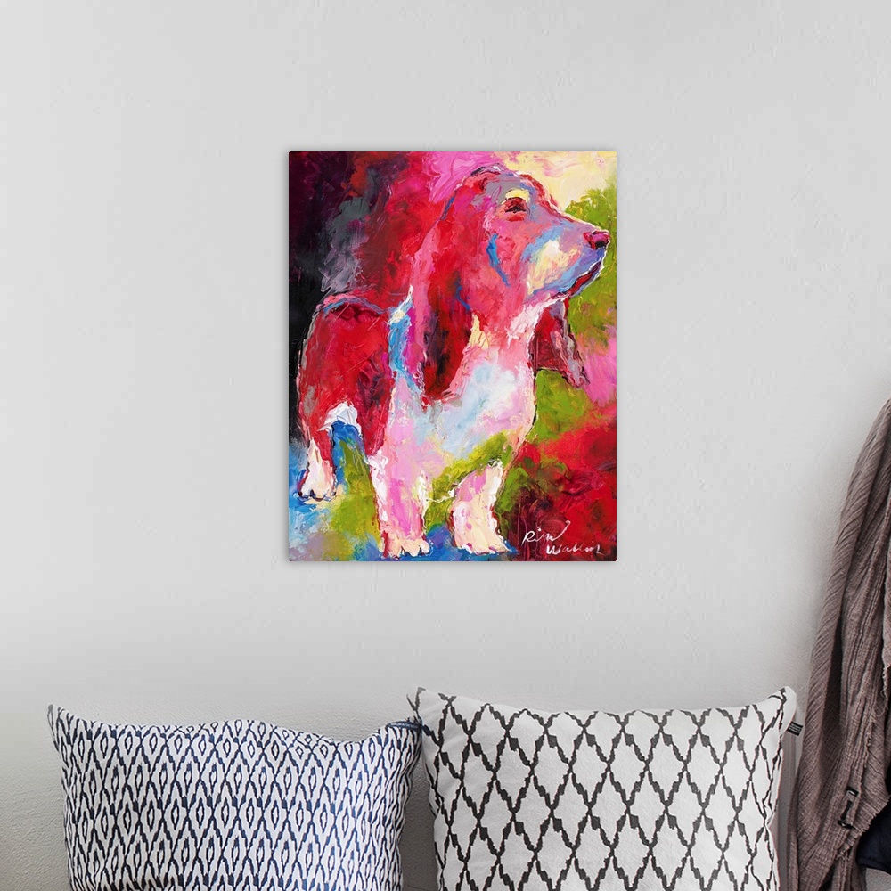 A bohemian room featuring Colorful abstract painting of a basset hound in pink, green, and blue hues.