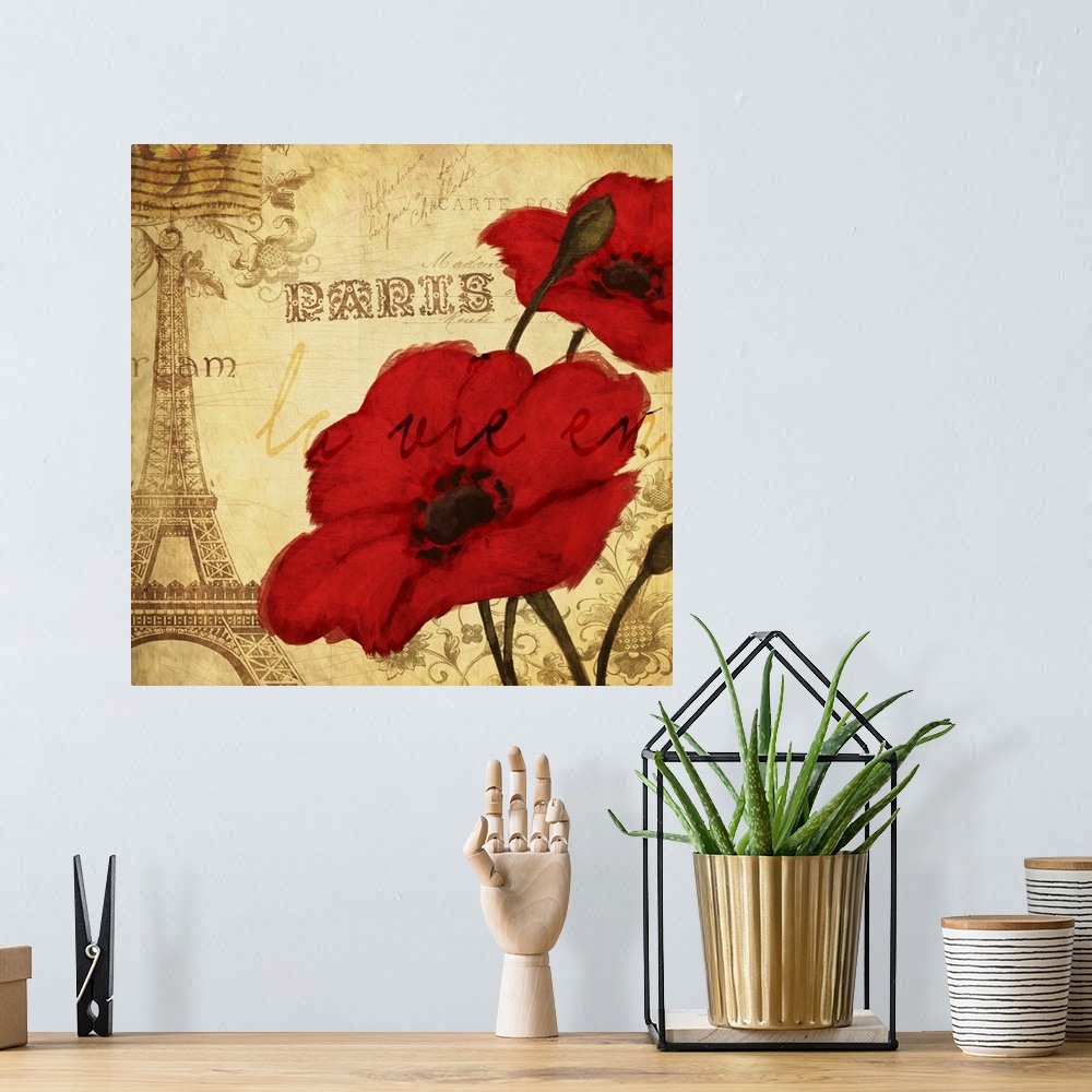 A bohemian room featuring Square art with red poppies and a sepia toned Paris themed background with a postage stamp at the...