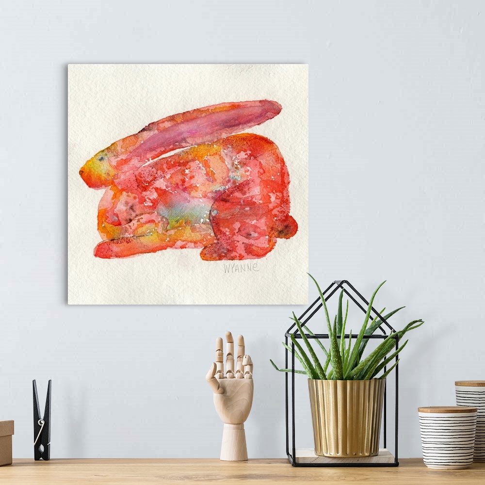 A bohemian room featuring A watercolor rabbit in shades of red and orange.