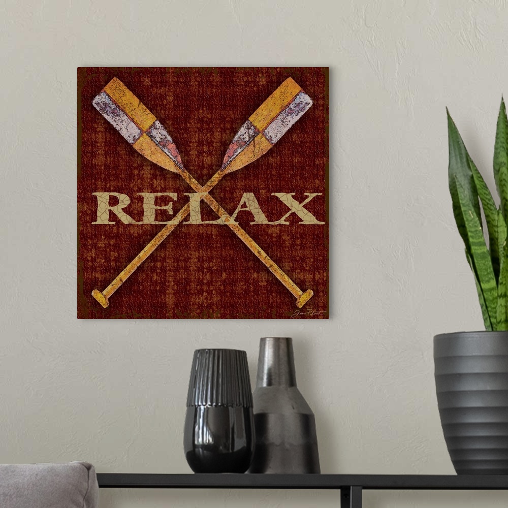 A modern room featuring Home decor artwork of crossed rowboat oars against a dark red background with the word Relax in g...