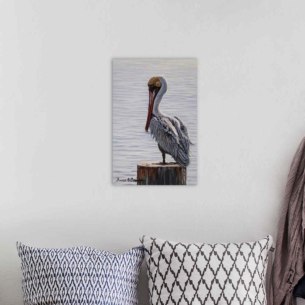 A bohemian room featuring Contemporary artwork of a brown pelican on a post.