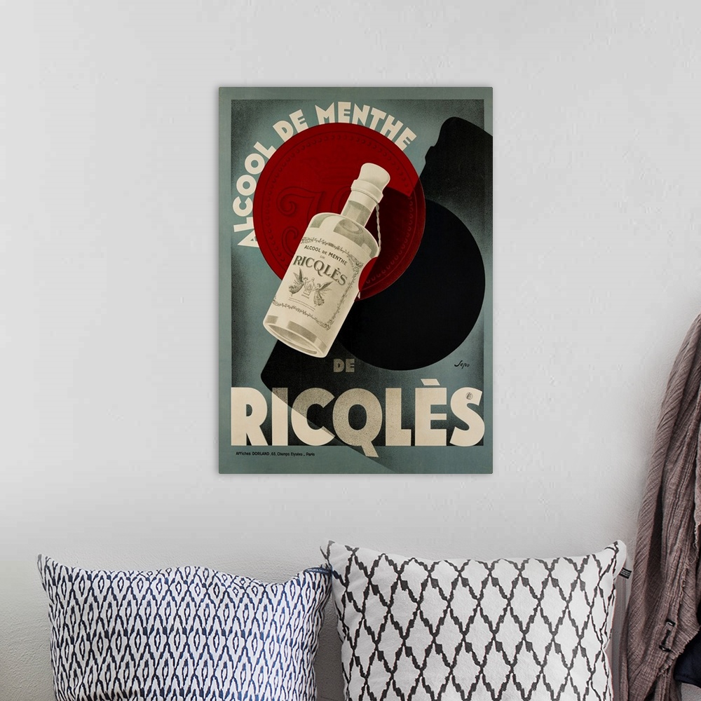 A bohemian room featuring Vintage advertisement artwork for Ricqles.