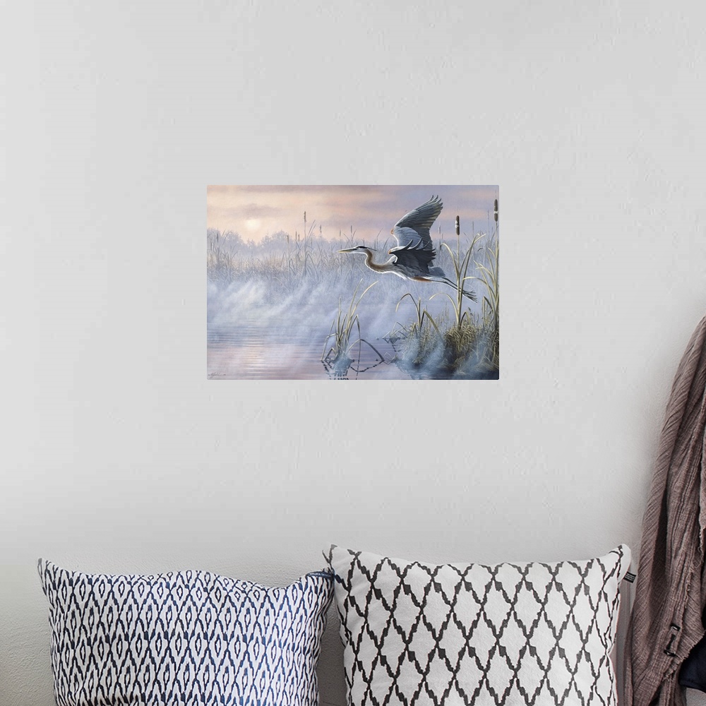 A bohemian room featuring Great Blue Heron flying over a misty marsh at sunrise.
