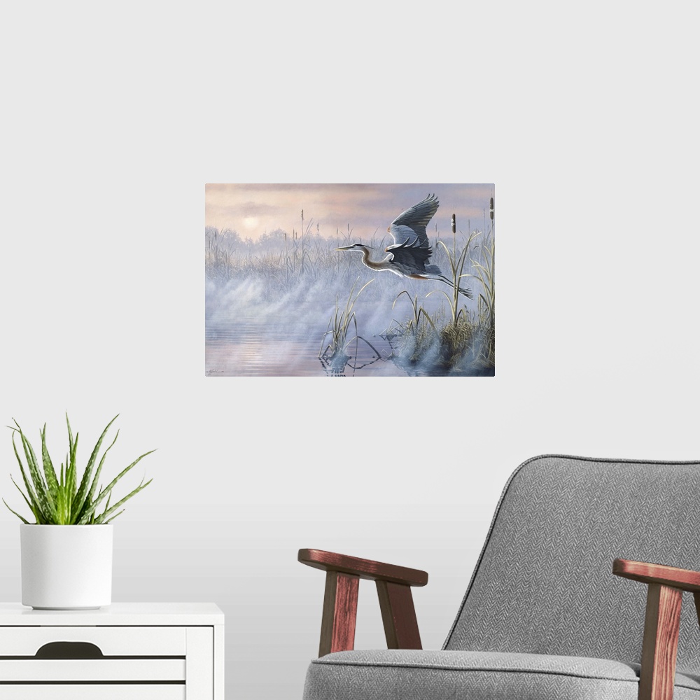 A modern room featuring Great Blue Heron flying over a misty marsh at sunrise.