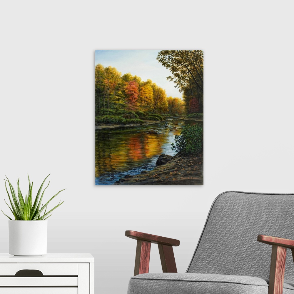 A modern room featuring Contemporary artwork of a river in the fall.