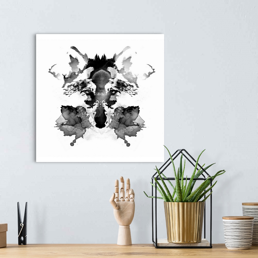 A bohemian room featuring Contemporary artwork of a wolf face in a Rorschach ink blot.