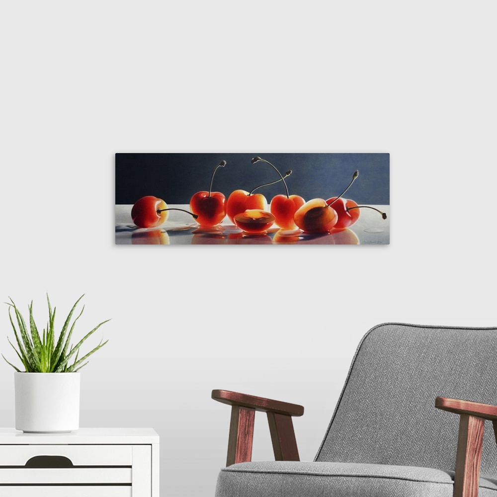 A modern room featuring Contemporary vivid still-life artwork of red cheery's on a white surface with sunlight illuminati...