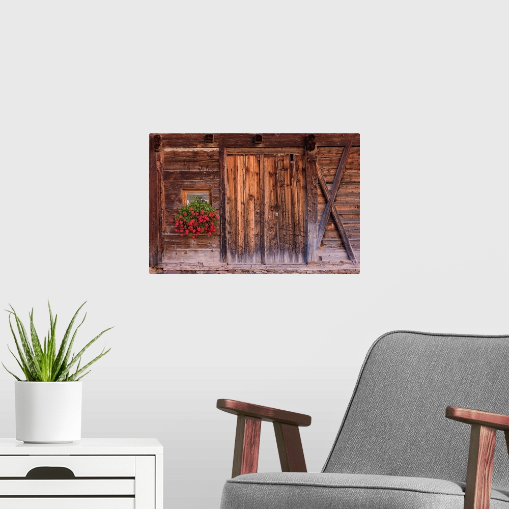 A modern room featuring A photograph of weathered wood on the exterior of an old barn.