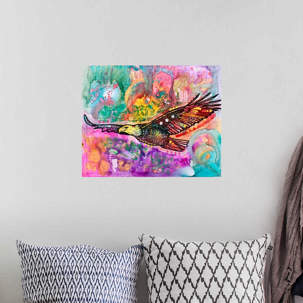 A bohemian room featuring Colorful painting of an eagle flying and surrounded by abstract designs.