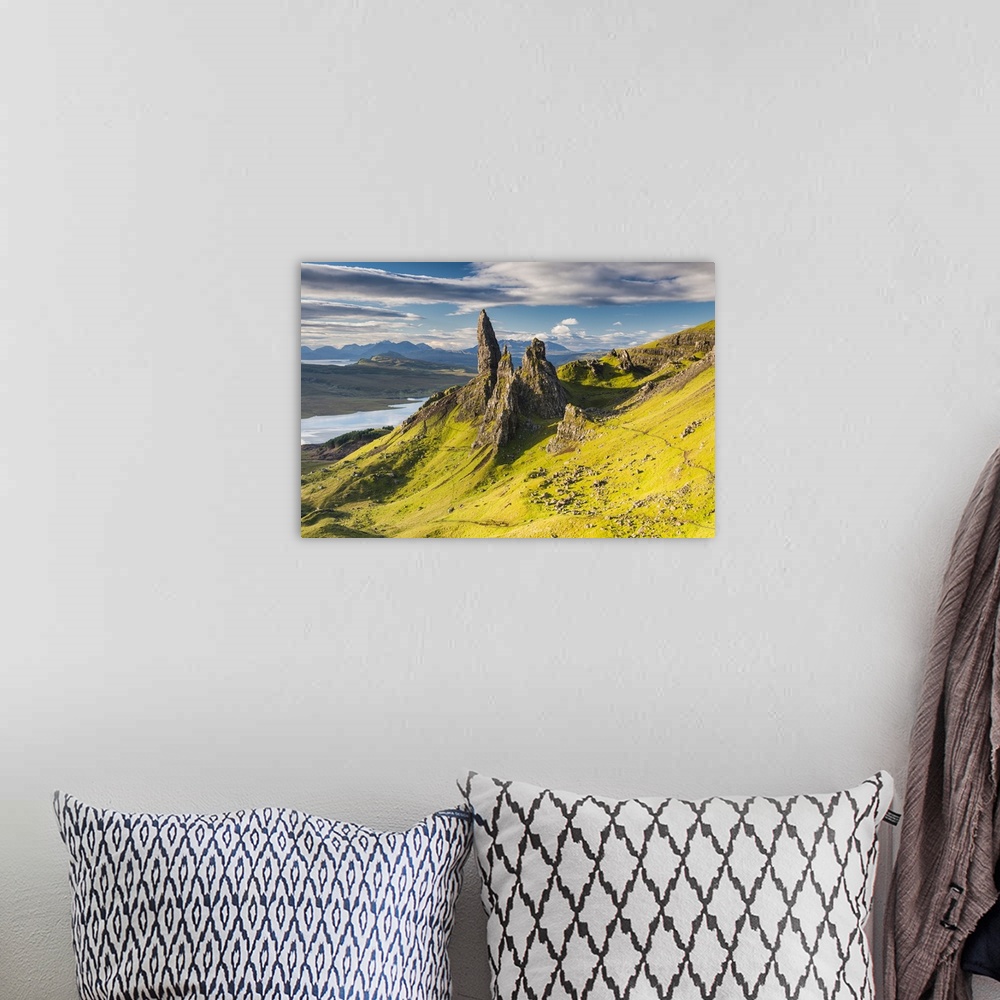 A bohemian room featuring A photograph of the Isle of Skye in Scotland.