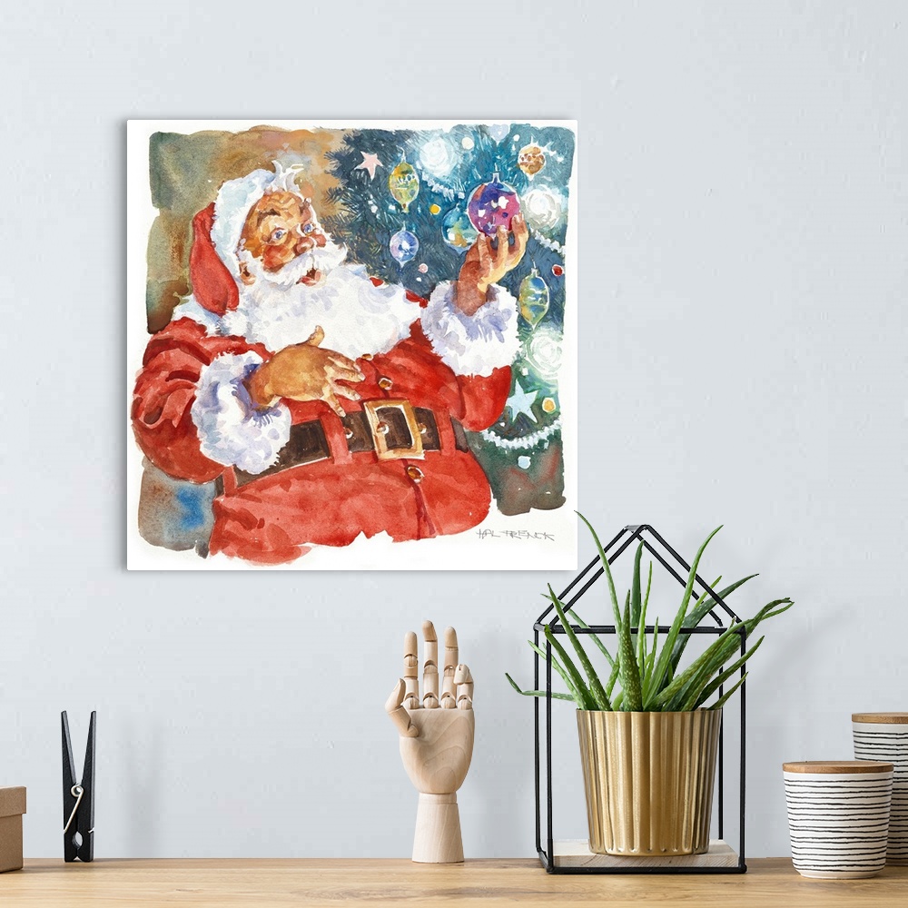 A bohemian room featuring Santa gazing at a christmas bulb in his hand, the tree is decorated beside him.