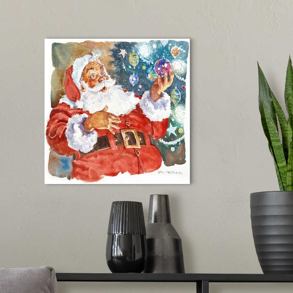 A modern room featuring Santa gazing at a christmas bulb in his hand, the tree is decorated beside him.
