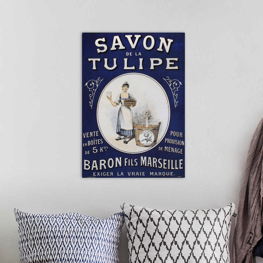 A bohemian room featuring Vintage poster advertisement for Savon Tulipe.