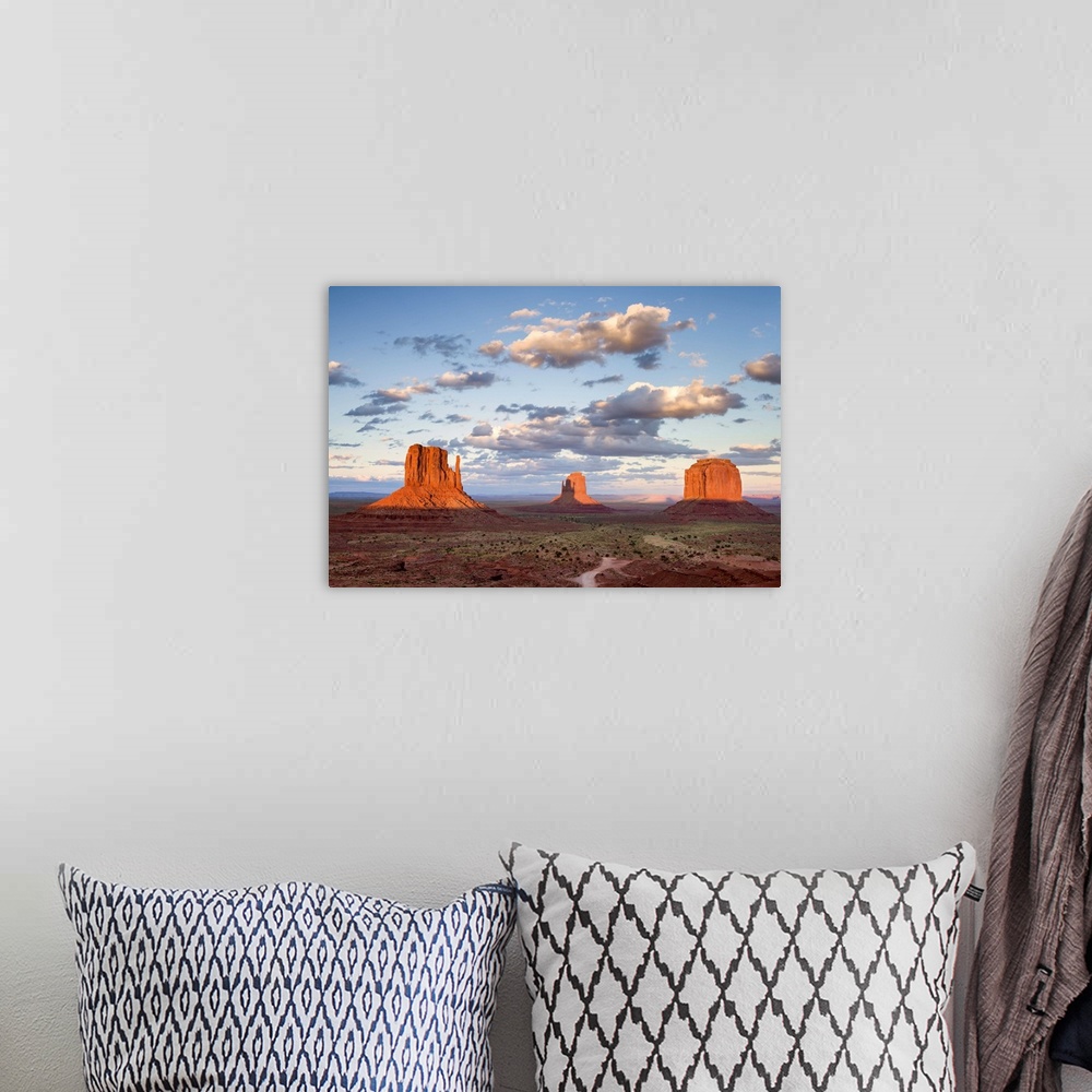 A bohemian room featuring A photograph of Monument Valley in Arizona.