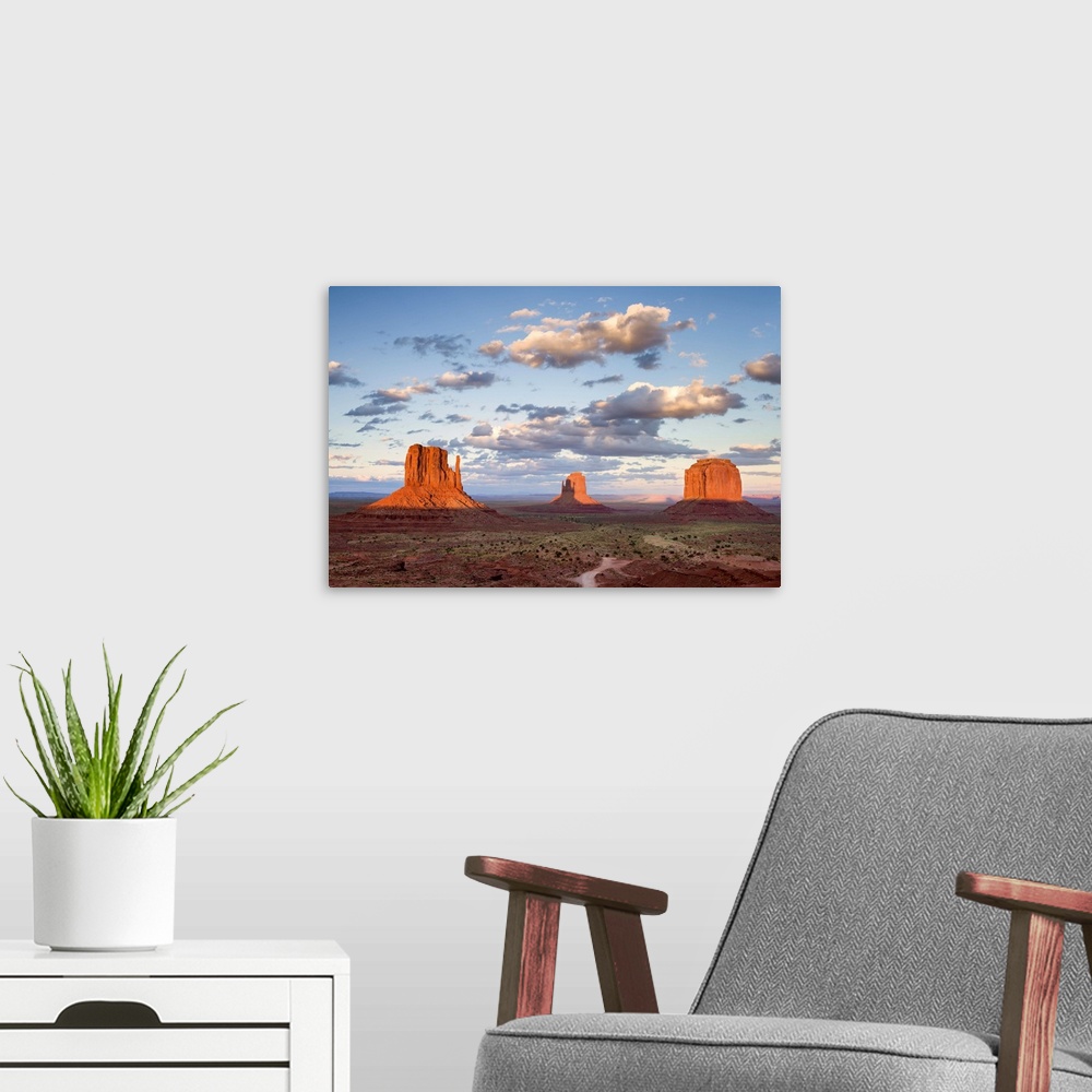 A modern room featuring A photograph of Monument Valley in Arizona.
