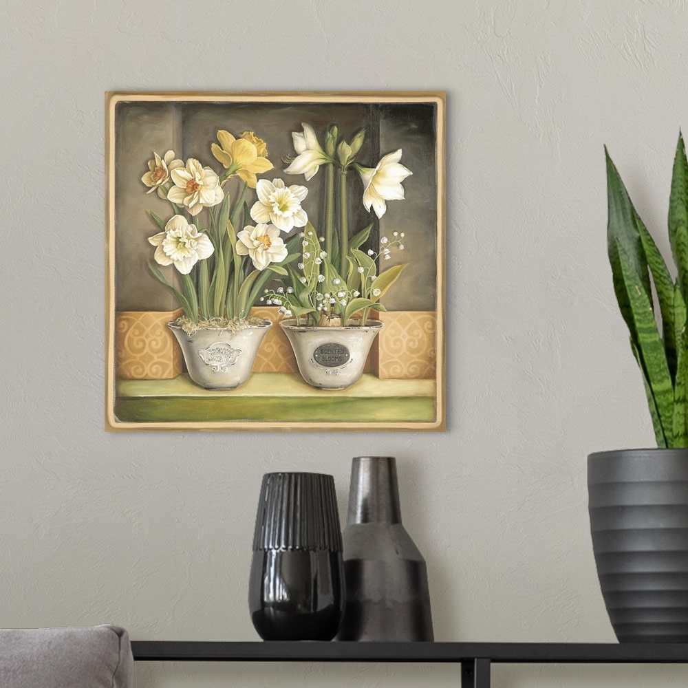 A modern room featuring 2 bowls with daffodils and lilies