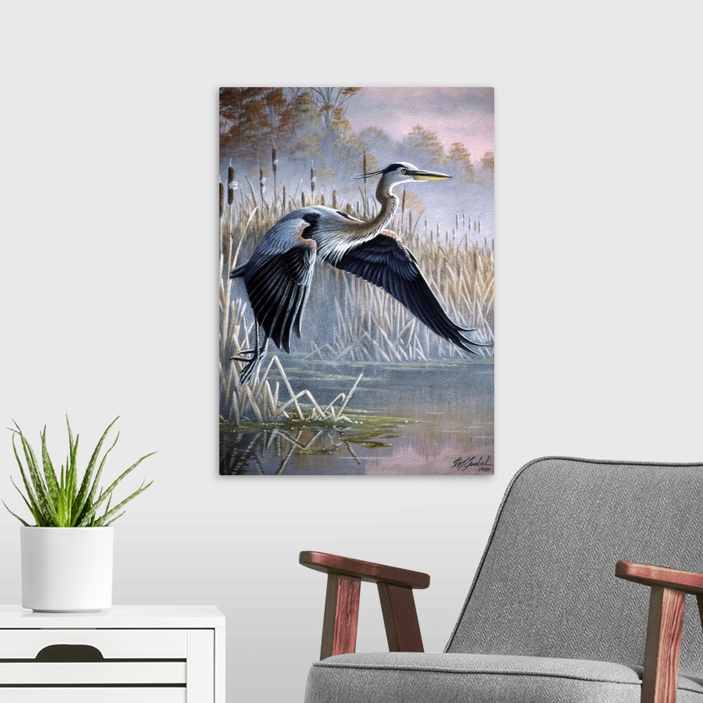 A modern room featuring Heron taking off over water.