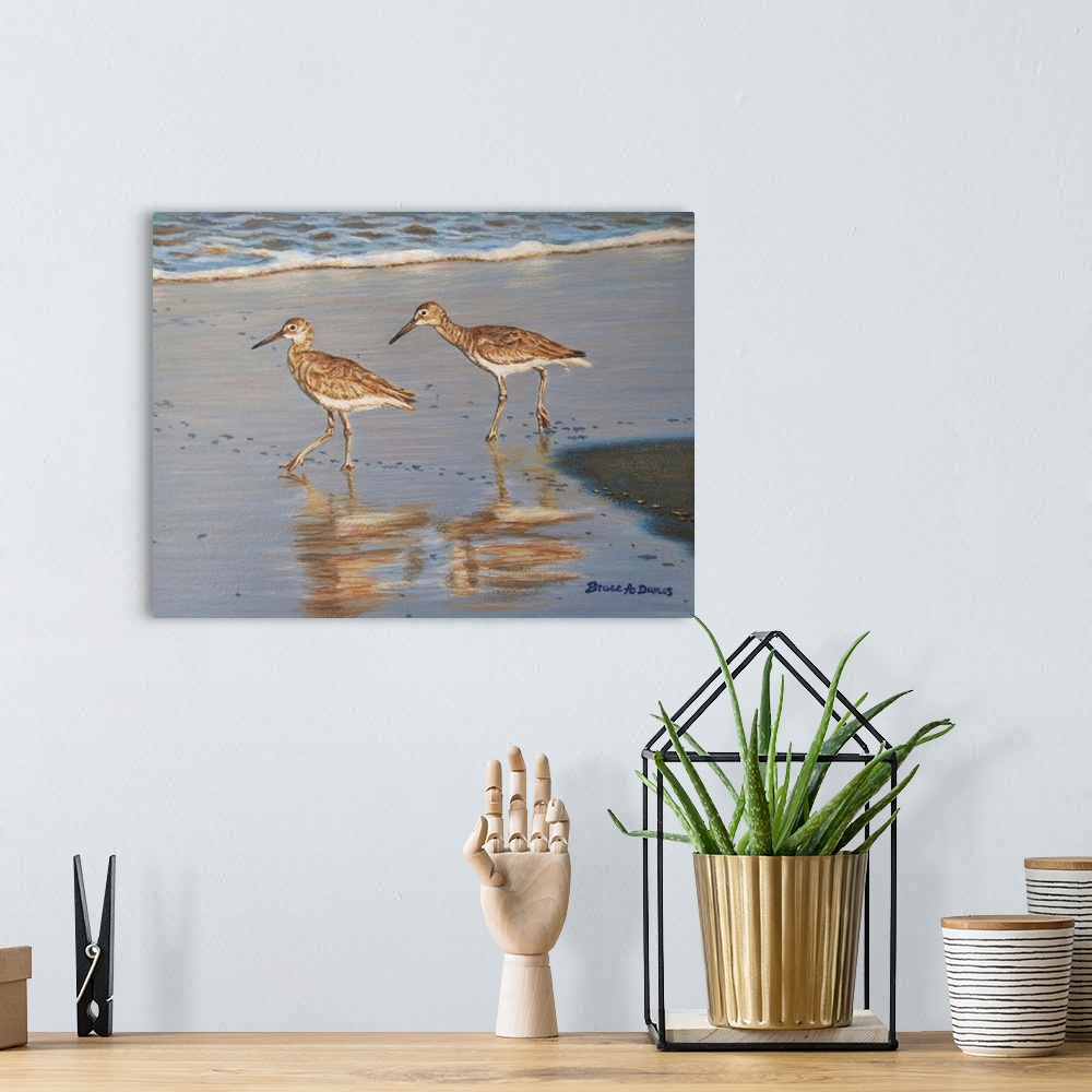 A bohemian room featuring Contemporary painting of two sandpipers walking along the shoreline.