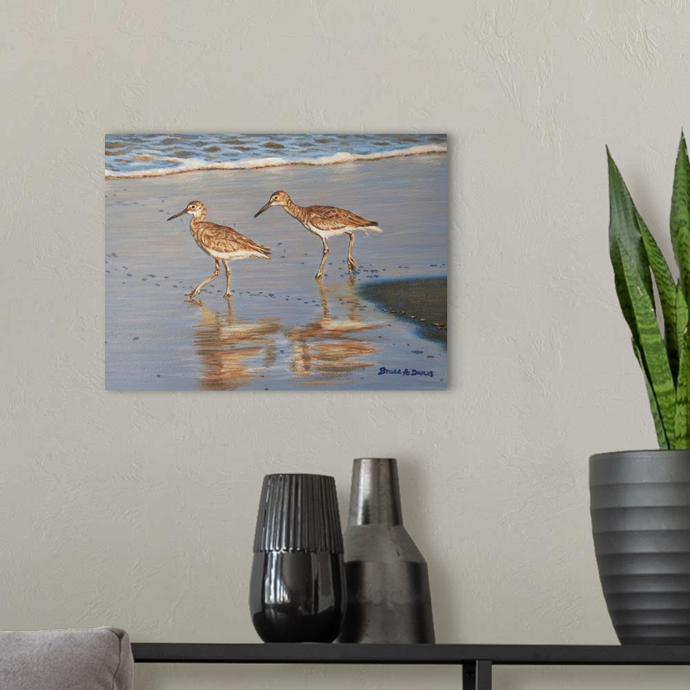 A modern room featuring Contemporary painting of two sandpipers walking along the shoreline.