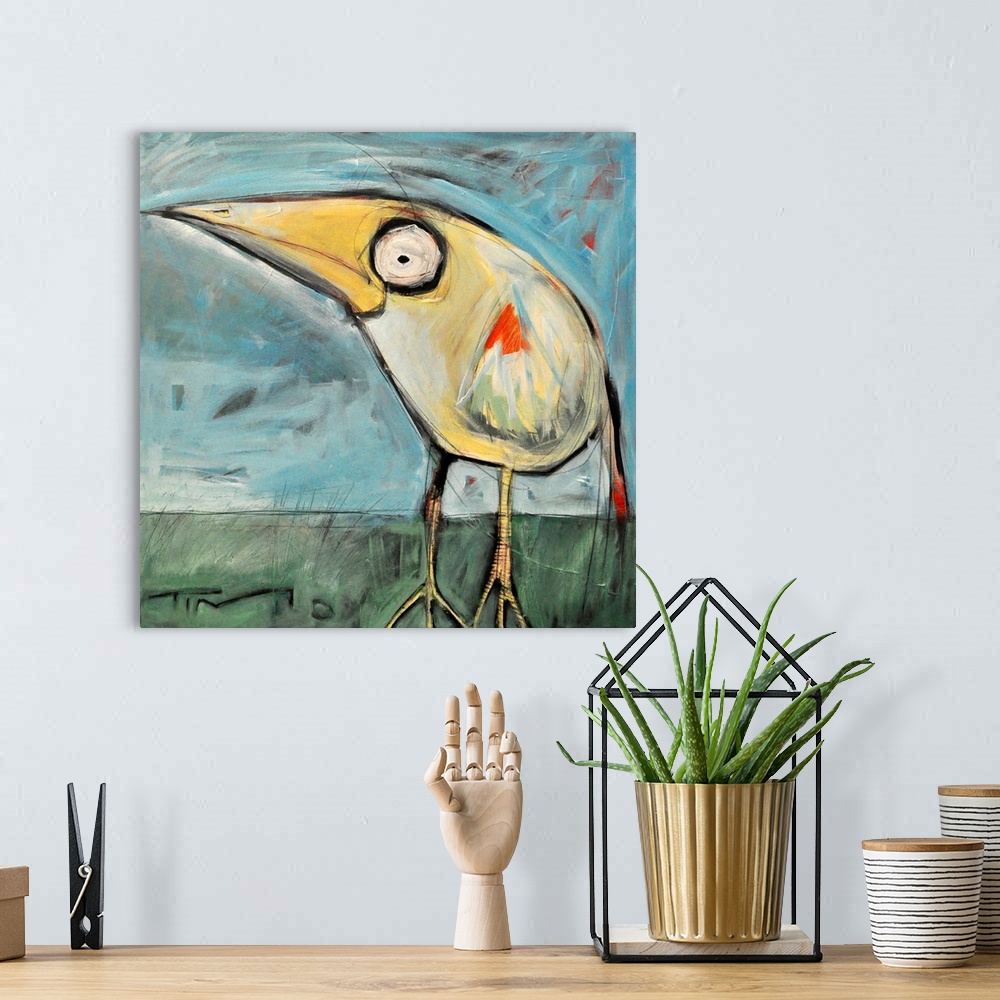 A bohemian room featuring A cartoonish painting of a stylized bird on a square shaped canvas by a contemporary artist.