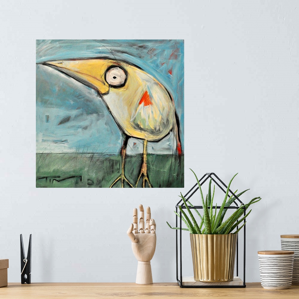 A bohemian room featuring A cartoonish painting of a stylized bird on a square shaped canvas by a contemporary artist.