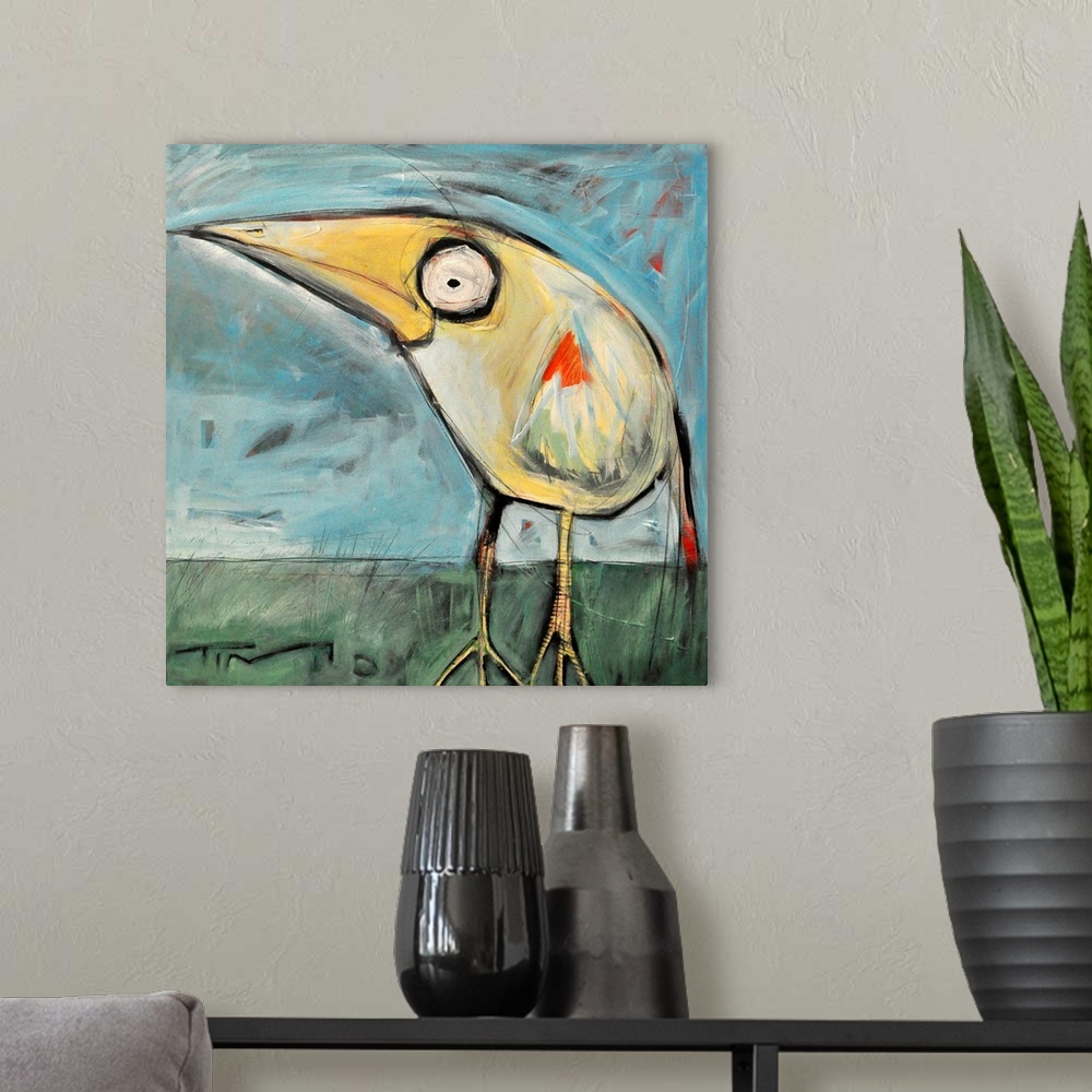 A modern room featuring A cartoonish painting of a stylized bird on a square shaped canvas by a contemporary artist.