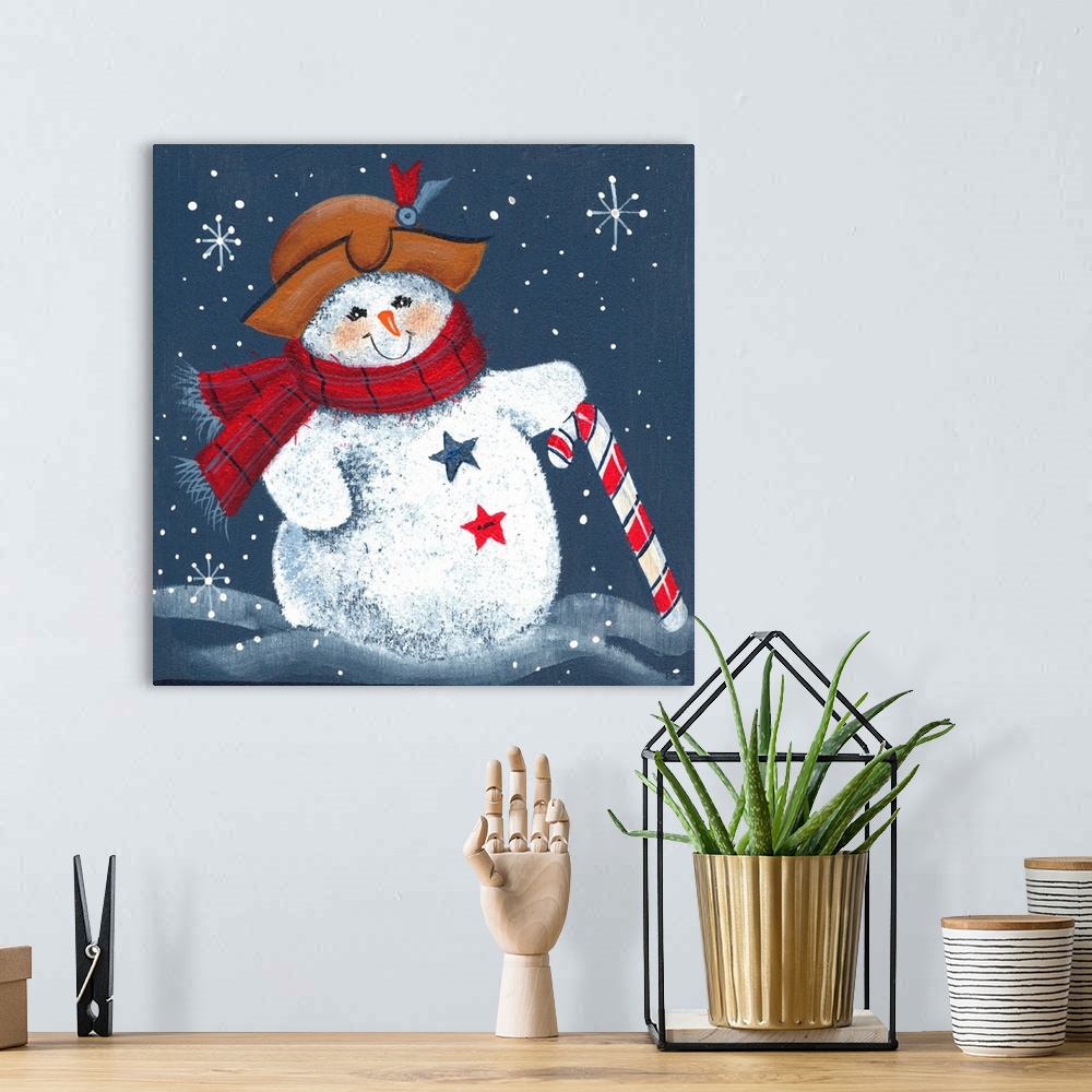 A bohemian room featuring A snowman with hand resting on candy cane.