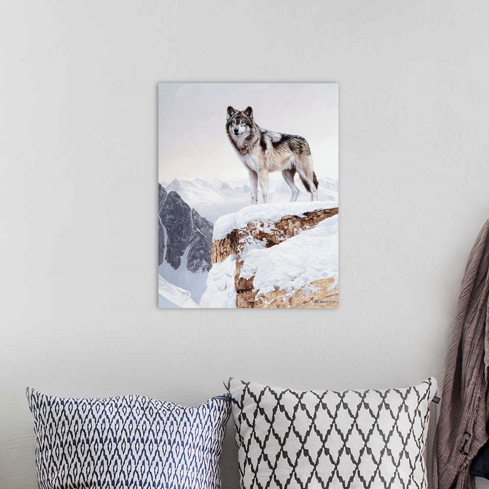 A bohemian room featuring A wolf stands on a snowy cliff face, silhouetted against the winter sky.