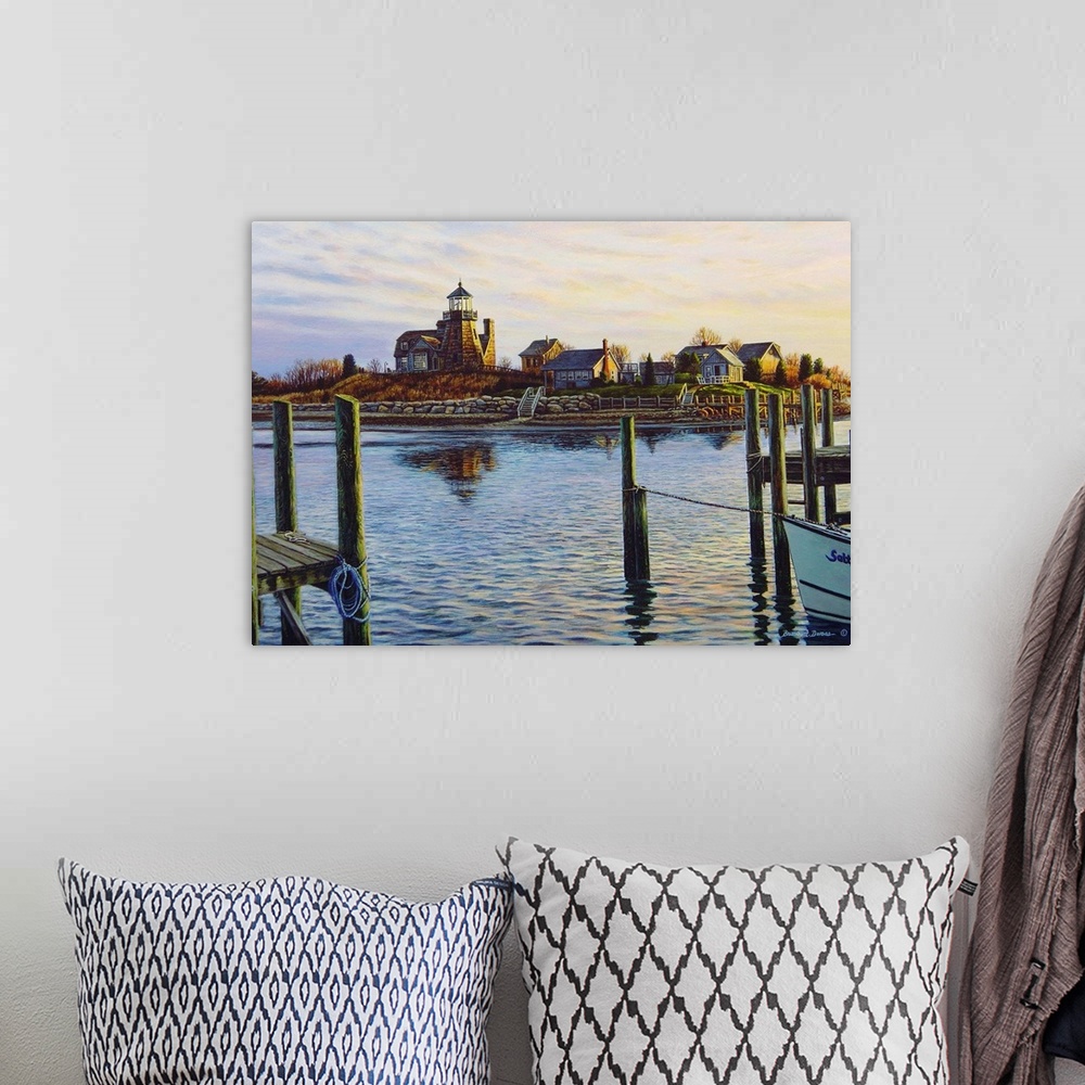 A bohemian room featuring Contemporary artwork of a water scene overlooking harbor with a lighthouse.