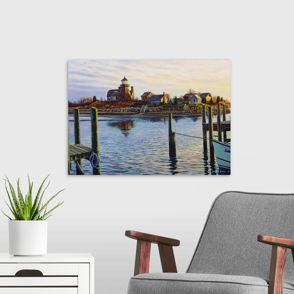 A modern room featuring Contemporary artwork of a water scene overlooking harbor with a lighthouse.