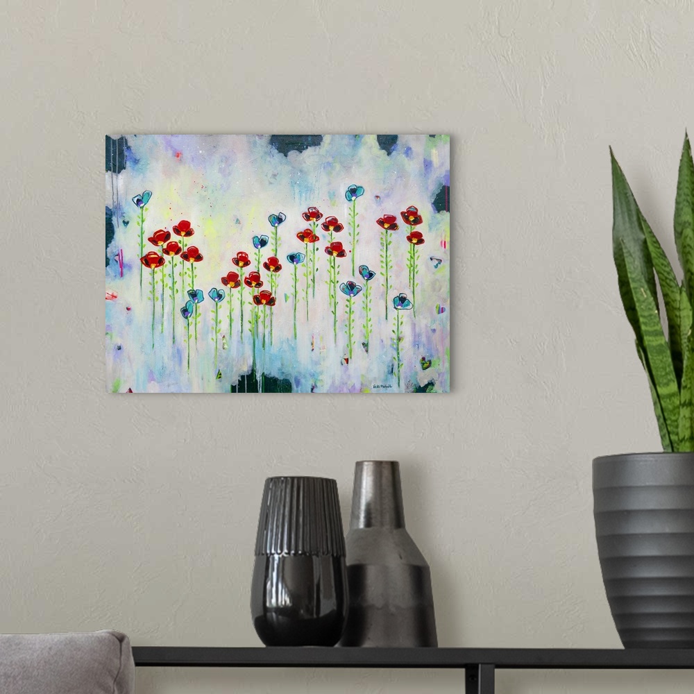 A modern room featuring Vibrant abstract painting with blue and red flowers that appear to be floating with long green st...