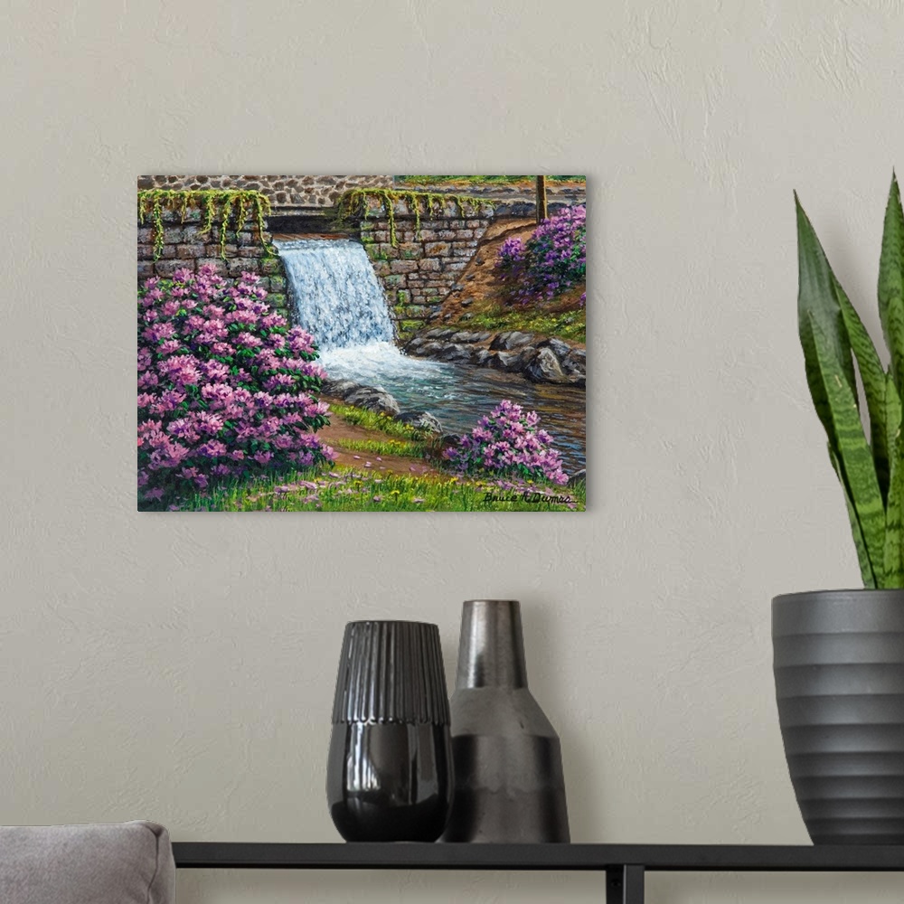 A modern room featuring Contemporary artwork of a small waterfall with purple flowers around it.
