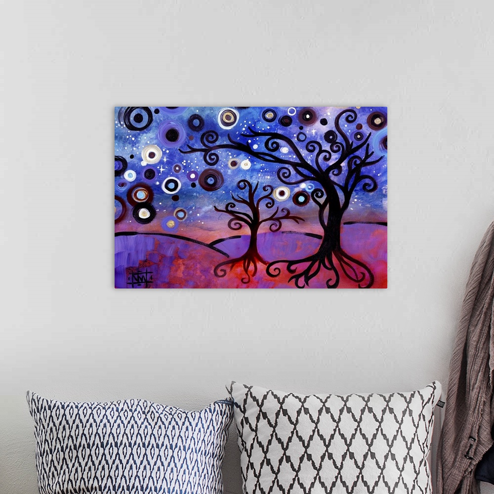 A bohemian room featuring Contemporary painting of two trees with curly branches and a starry sky.