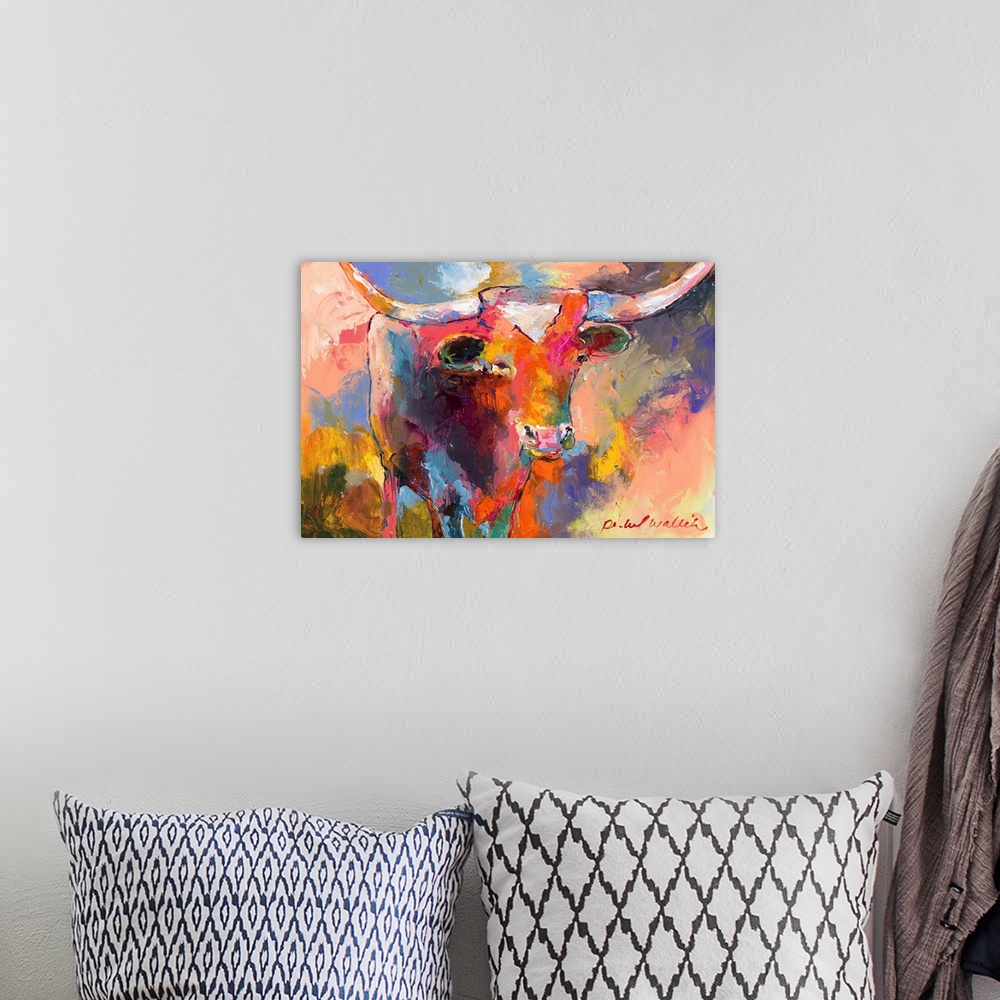A bohemian room featuring Colorful abstract painting of a bull.