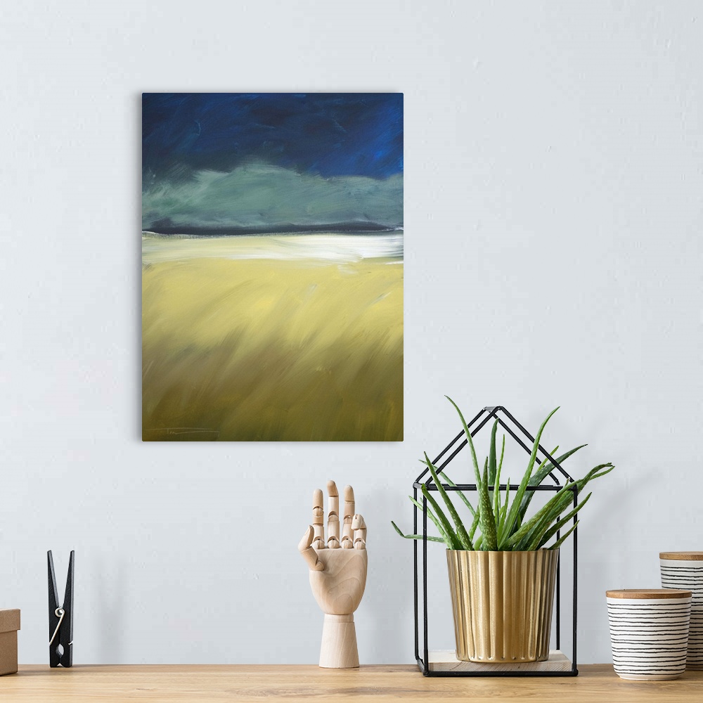 A bohemian room featuring Contemporary landscape painting of dark storm clouds approaching on the horizon.