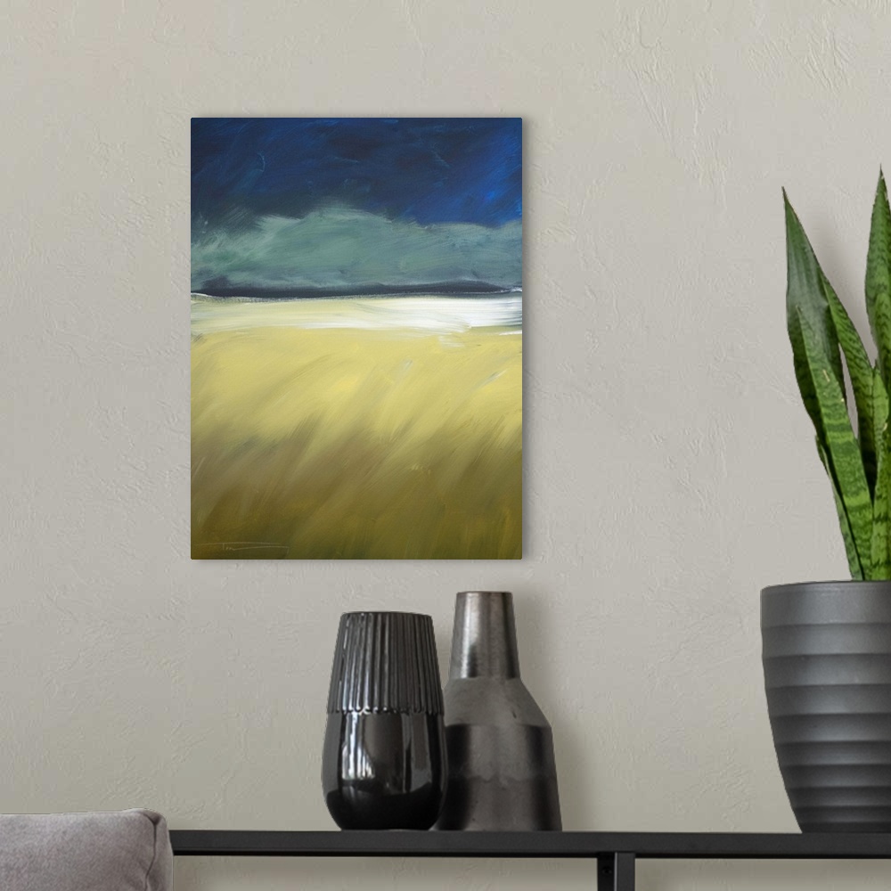 A modern room featuring Contemporary landscape painting of dark storm clouds approaching on the horizon.