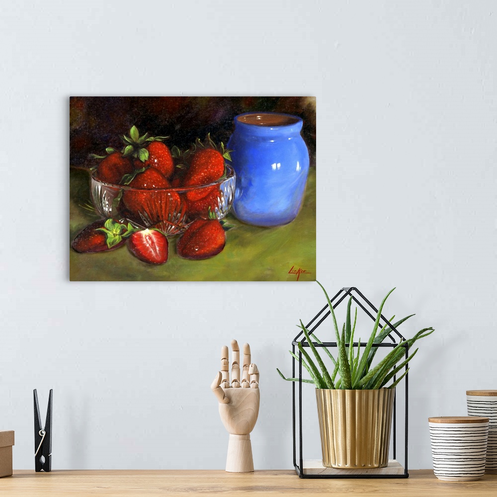 A bohemian room featuring Contemporary still life painting of a dish of strawberries next to a small ceramic vase.